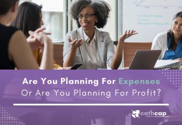 Header image for Planning for Expenses or Profit including three business women discussing business financial objectives