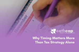 Business owner reviewing financial timeline and tax planning strategy to make earlier financial decisions