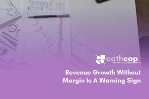CFO reviewing financial dashboard showing revenue growth without margin improvement