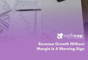 CFO reviewing financial dashboard showing revenue growth without margin improvement