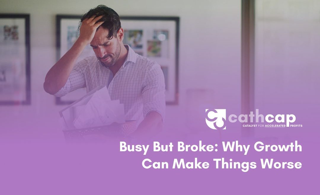 Business owner reviewing cash flow forecast for growing business