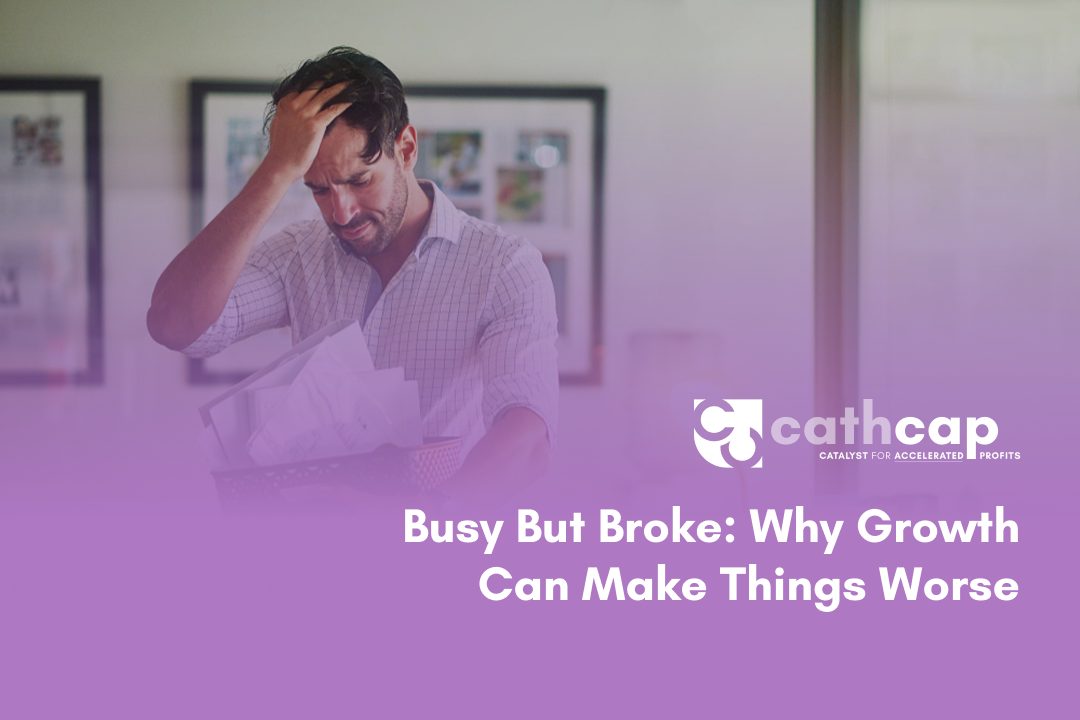 Business owner reviewing cash flow forecast for growing business