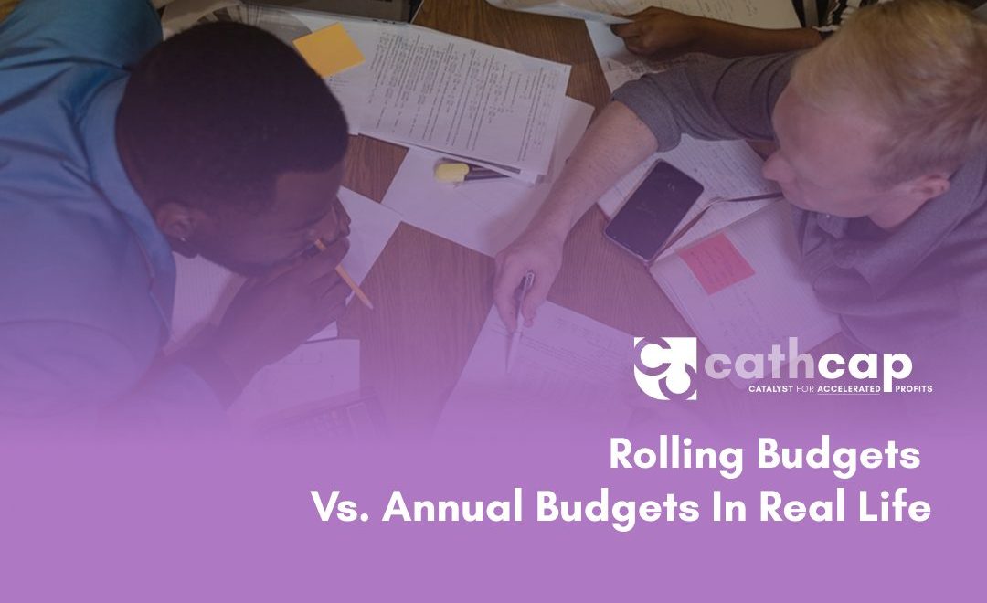 Law firm managing partner reviewing a mid-year rolling budget update showing Q3 cash projections based on current collections and lockup