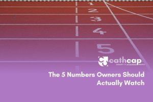 Law firm owner reviewing the five key financial numbers that show firm profitability
