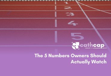 Law firm owner reviewing the five key financial numbers that show firm profitability