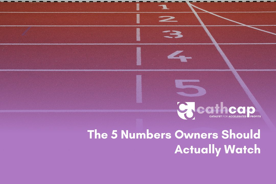 Law firm owner reviewing the five key financial numbers that show firm profitability