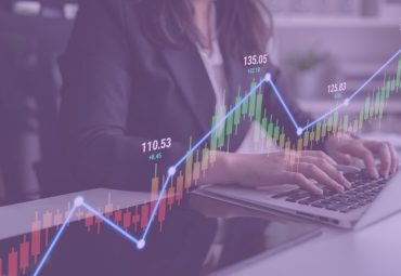 How Proper Forecasting Helps Grow Your Law Firm heading person working on computer forecasting numbers